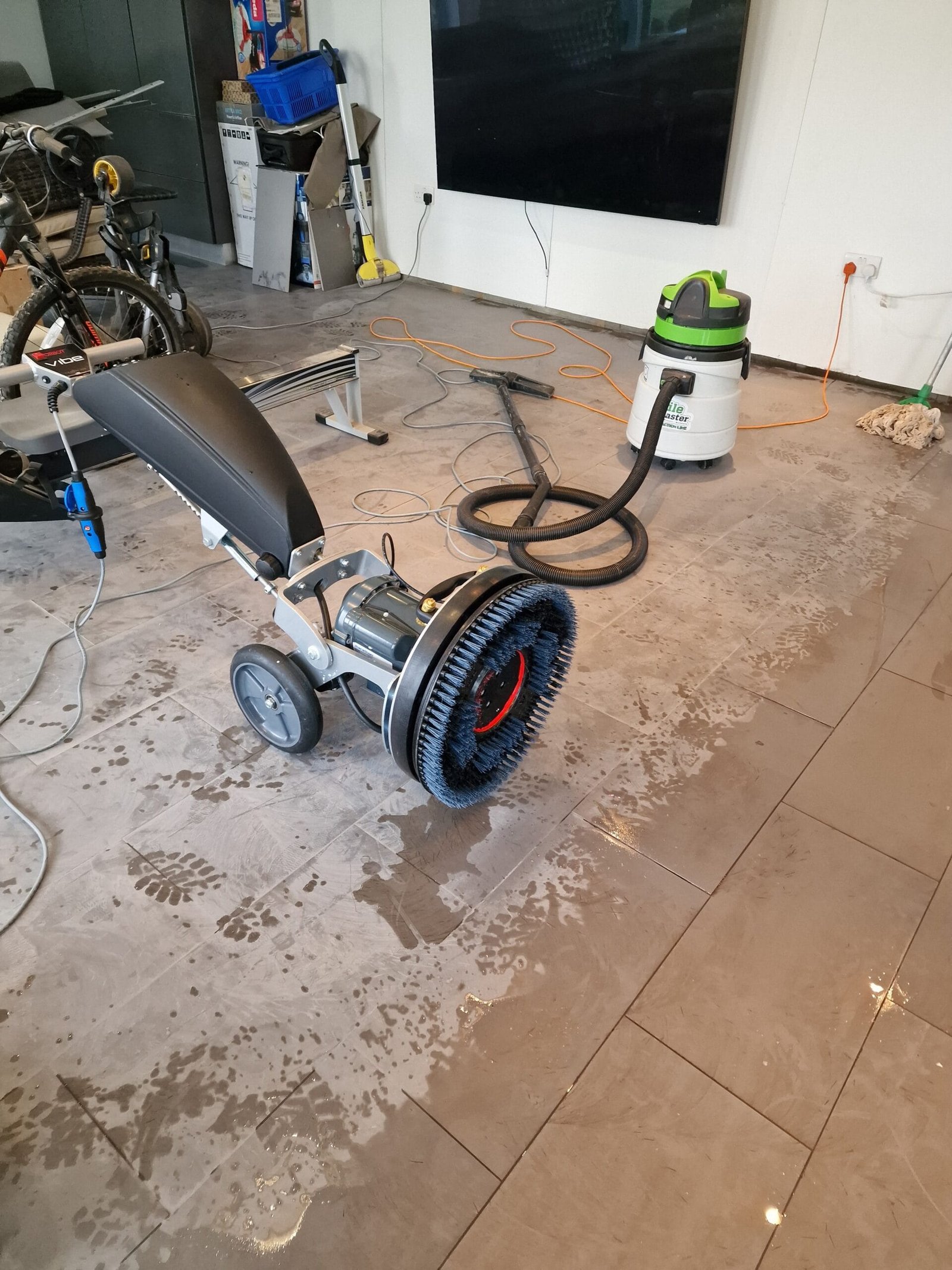 Grout Haze Removal • Floor Champions Rotary machine scrubbing grout haze off ceramic floor tiles