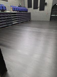 auditorium floor with scratches removed and resealed