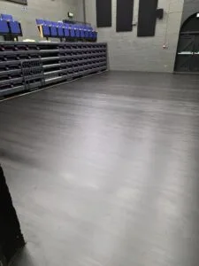 auditorium floor with scratches removed and resealed